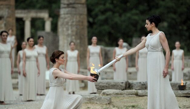 Olympic flame lit and ticket sale reopened
