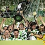 Dan Murray lifts the Premier League trophy 28/10/2011