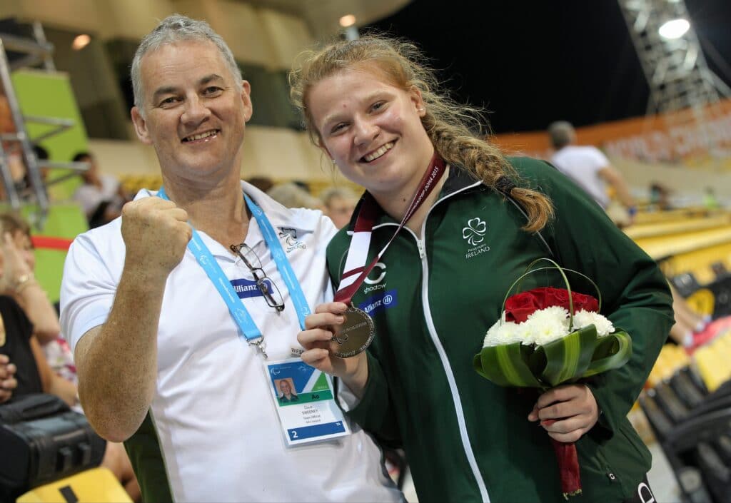 26 October 2015; Ireland's Noelle Lenihan, from Charleville, Co. Cork, celebrates with team official, after winning silver in the Women's Discus F37. IPC Athletics World Championships. Doha, Qatar. Picture credit: Marcus Hartmann / SPORTSFILE