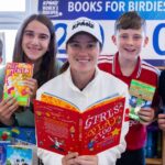 KPMG Turns Birdies into School Books